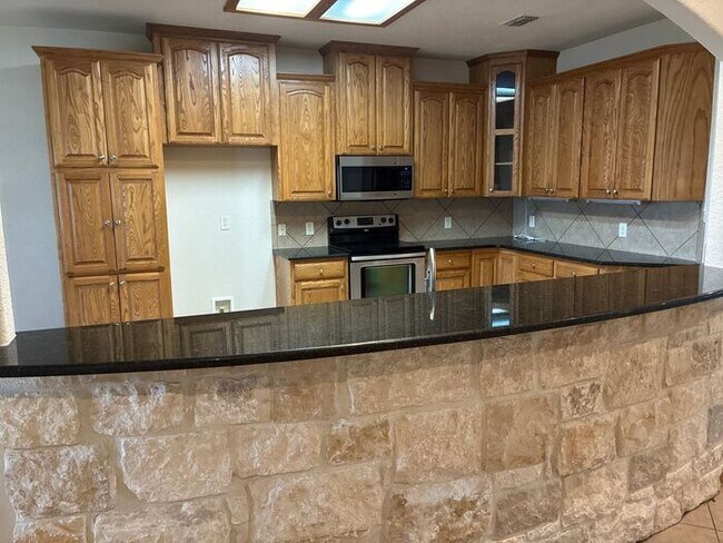 Photo - 5BR/3BA w/ Fenced Yard + Covered Parking in Seguin, TX