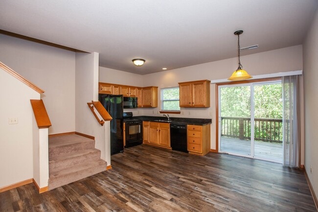 Building Photo - 3D Tour Available - Quick Access to Fort Riley + Community Pool + Washer & Dryer + Lawn Care incl...