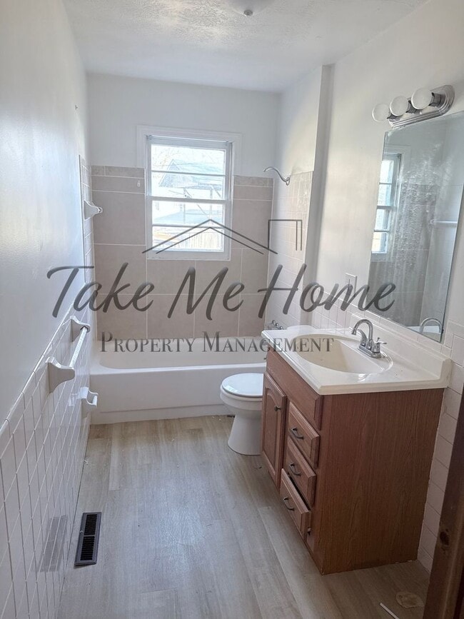 Photo - Charming 2-Bed, 1-Bath Home for Rent in All-Brick Fourplex