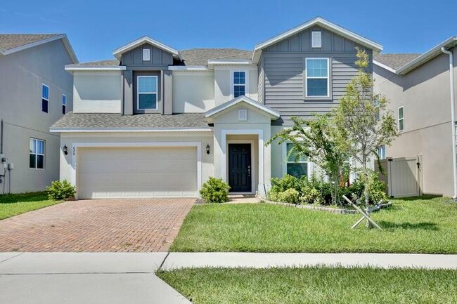 Building Photo - Stylish and Spacious 3/2.5 Home with No Re...