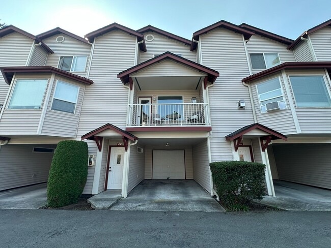 Building Photo - Updated 3-Story Condo with Balconies in So...