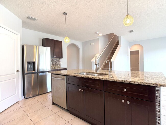 Photo - Move-In Ready • Lawn Care Included • Pet-Friendly!