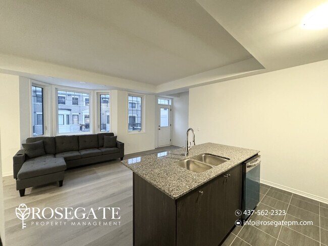 Photo - Spacious 3-Bedroom, 2.5-Bathroom Townhome with Parking & Juliet Balcony in Brampton Unit 75