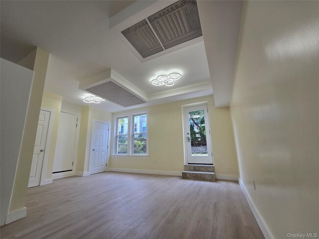 Building Photo - 32-64 45th St Unit Garden Apartment