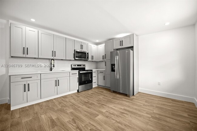 Building Photo - 10990 NW 18th Ave Unit 2