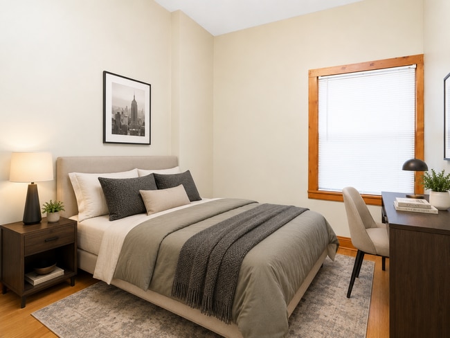 Photo - Spacious 2BR + Sunroom Main Floor in NE Arts District – Steps to Logan Park & Breweries Unit 1