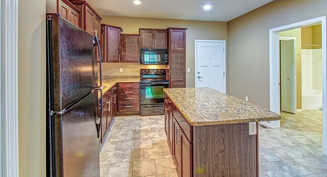 Photo - 7442 S Louise Ave Unidad 106