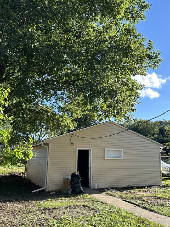 Detached garage with new siding & new roof - 1444 Dodge St