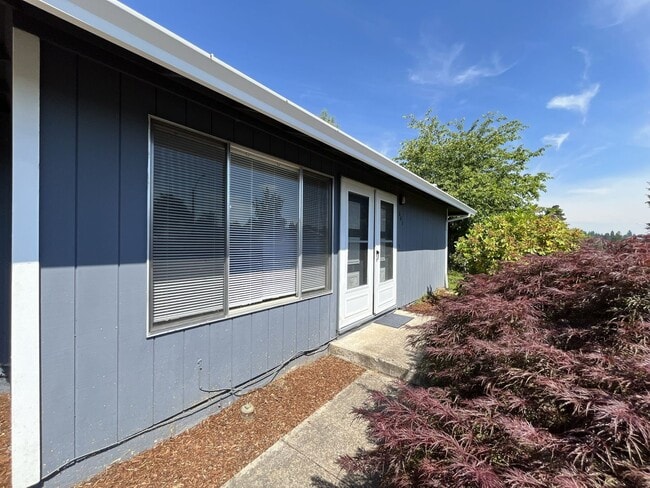 Photo - Charming Ranch Home with Sunroom or 4th Bedroom, Two-Car Garage and Fenced Backyard
