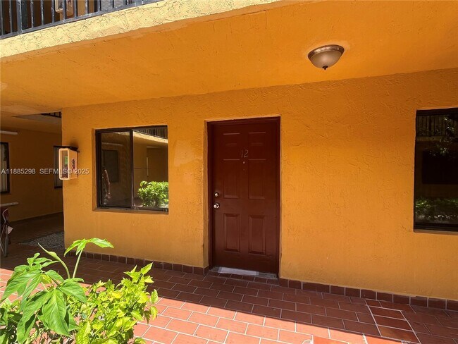 Building Photo - 6278 W 22nd Ct Unit 12