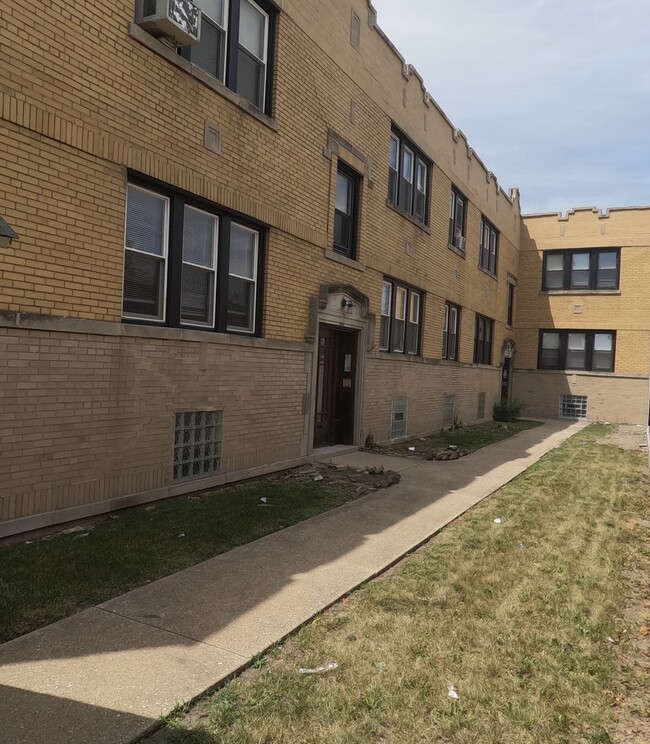 Building Photo - 1206 N Laramie Ave Unit 1A Rental
