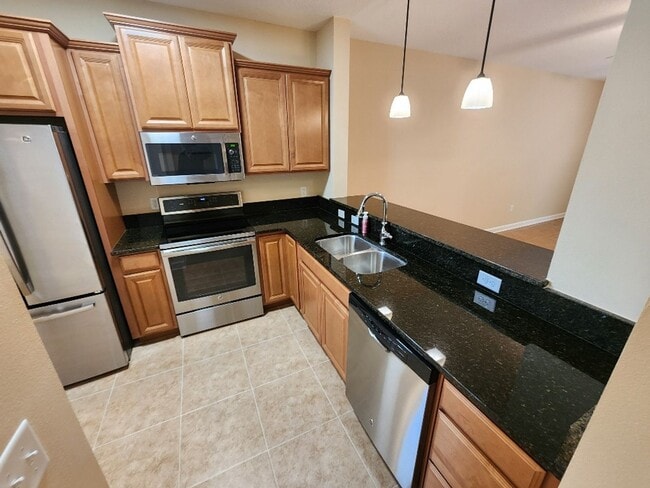 Photo - Beautiful 2/2 Bouchelle Condo with private garage