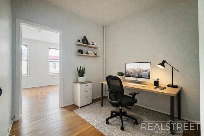 Photo - Spacious 1.5-Bedroom Penthouse Apartment in Prime Bushwick! Unit 3L