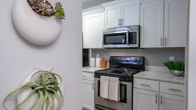 Every detail contributes to an upscale living experience in our upgraded kitchens, from the stainless-steel appliances embraces by Carrara marble-inspired countertops to the pristine white shaker cabinetry.