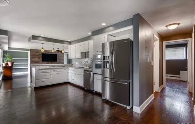 Building Photo - 858 Wehrle Dr Unit 1