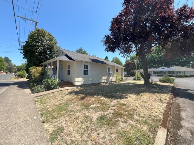 Photo - Charming 2-Bedroom Home with Open Living Space and Tile Flooring