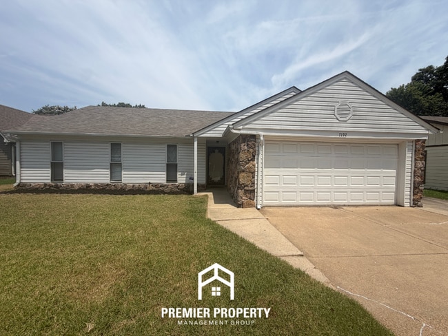 Building Photo - Charming 3BR/2BA Bartlett Area Home | Soaring Vaulted Ceilings, Rustic Fireplace & 2-Car Garage