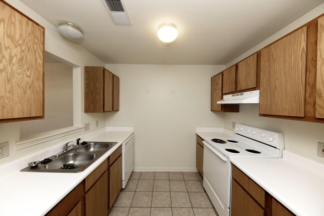 Kitchen area with cabinetry