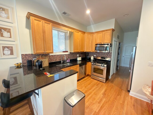Photo - Beautifully updated & maintained 2 bed/2 bath Noble Square condo in an intimate 3 unit building.