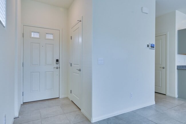 NW!! Gated!! Built 2023!!!! Corner Lot!! Low Maintenance Desert Landscape Front!! Patio & Synthet...