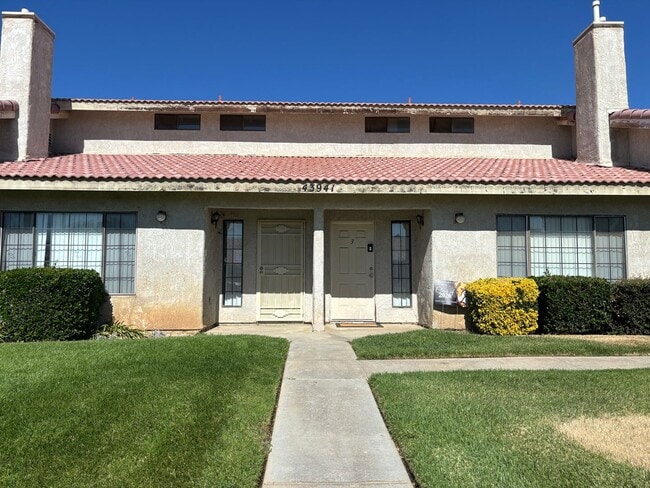Building Photo - 43941 18th Street E Unit #2