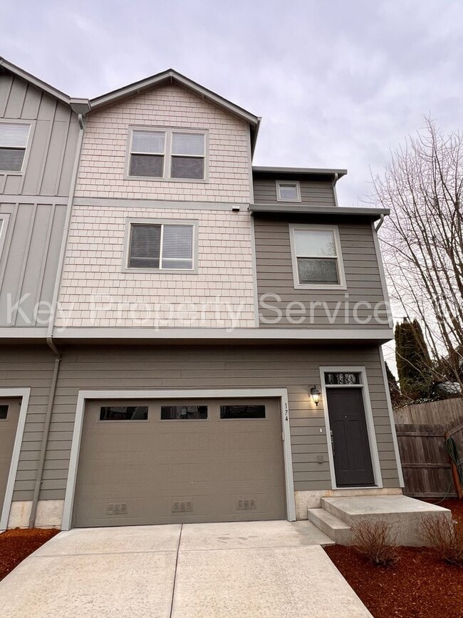 Building Photo - MOVE IN SPECIAL!!! Woodland Townhome with Huge Tandem Garage