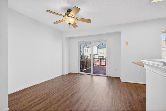 Photo - 3BR Townhome in Russett | 3 Levels | Walkout Basement + Deck | $2,400/mo** Beautiful 3-level town...