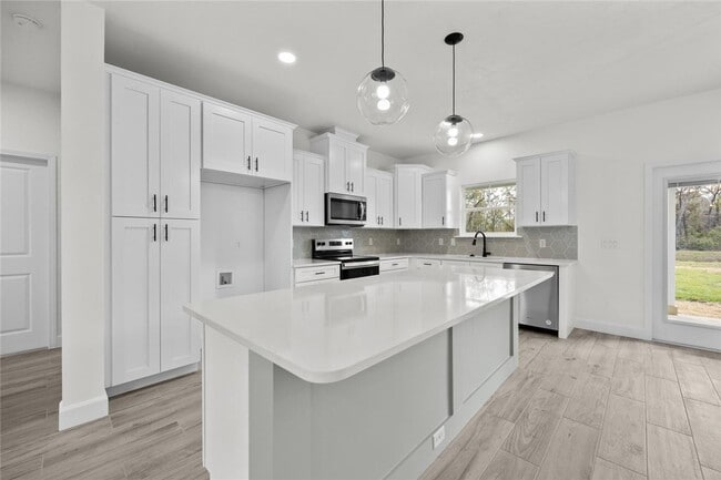 Photo - New Construction 3/2 in Bronson