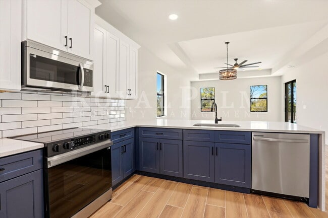 Building Photo - 3BR/2BA New Construction with Pool, Fence & Garage — Built Yesterday, Ready Today - Cape Coral