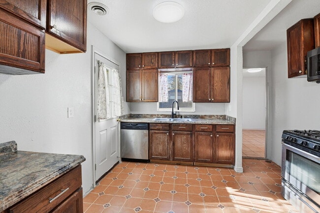 Photo - $2,030.95 - 3 Bedrooms, 1 Bathroom, Single Family Home in Aurora with fenced Yard!