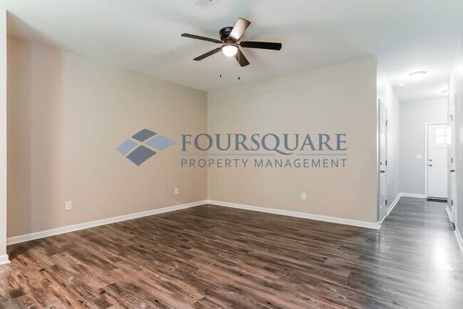 Photo - Spacious 3-Bed Townhome with Back Patio & ...