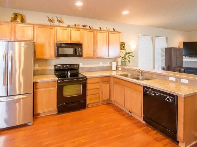 Photo - Fabulous 2 Bedroom 2.5 Bathroom Townhome with Vaulted Ceilings, Private Yard & Spacious Tandem Ga...