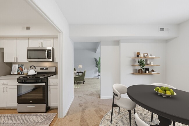 Step into modern elegance at Fairway Apartments. This beautifully designed kitchen and inviting dining area reflect your lifestyle aspirations. Enjoy spacious living with stylish finishes and natural light. Schedule your tour today!