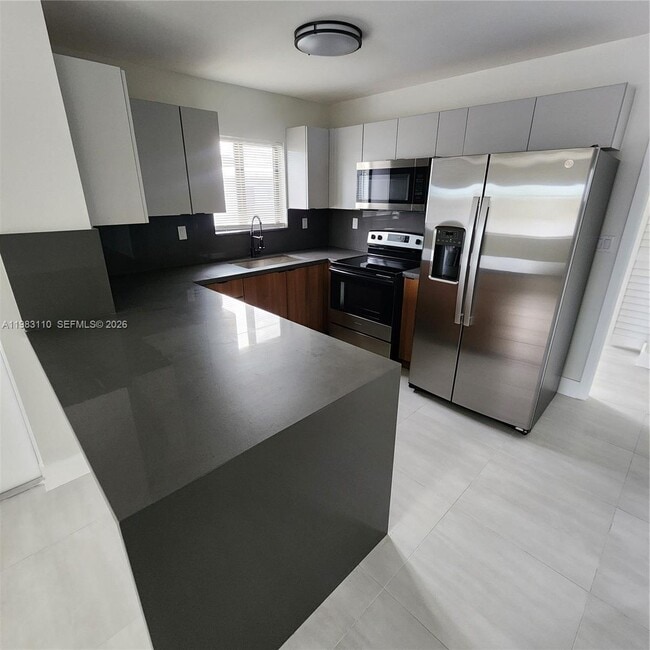 Photo - 1171 NW 66th St Unit 1173