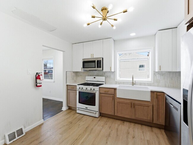 Photo - Charming Renovated 4-Bedroom Rental with Spacious Backyard & Bonus Basement Space in Somerdale