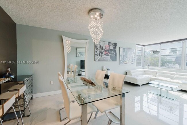 Building Photo - 8000 Harding Ave Unit 2B