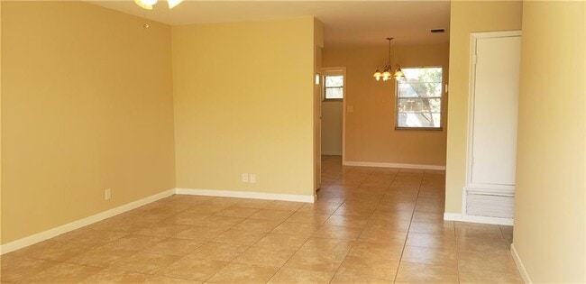 Bright living room with tile flooring