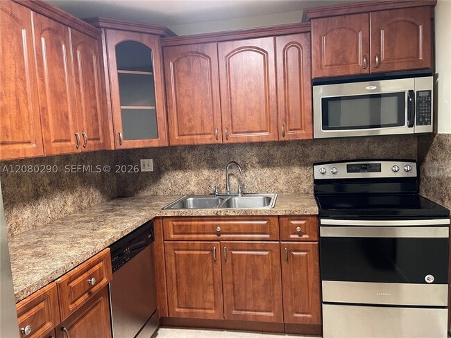 Building Photo - 14150 SW 84th St Unit 208-I