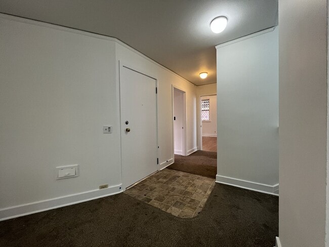 Photo - Expansive 4BR 2,900+ Sq Ft Home with Theater-Style Living Room & Bonus Hobby Workshop
