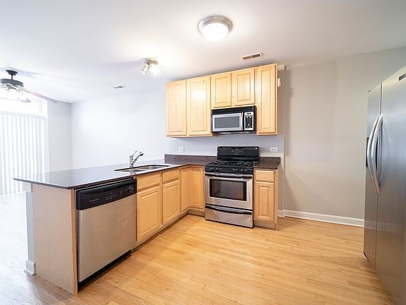 Building Photo - "Discover Urban Elegance: Spacious 2-Bed, ...
