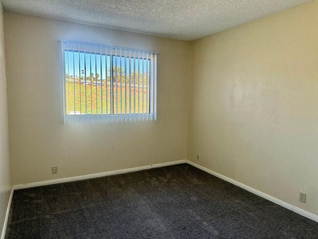 Photo - 2BD/2BTH with Private Patio, Walk-In Closet, Onsite Laundry, and Parking! Unit 07