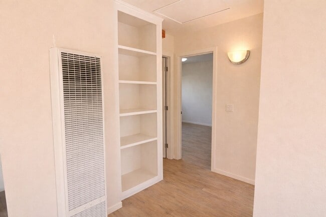 Photo - Recently Renovated, Single-Level 2-Bedroom Apartment with Small Fenced Yard. Unidad O