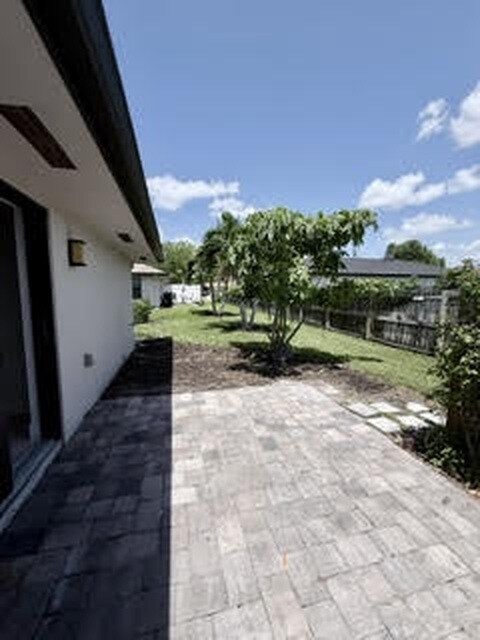 Rear yard (more grass has been added) - 9775 Alabama St Unit A