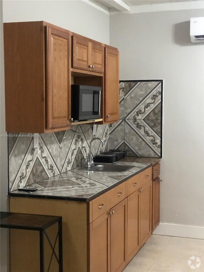 Building Photo - 9710 NW 24th Ct Unit 0 Rental