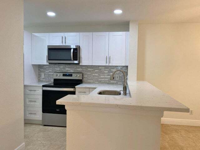 Building Photo - 1885 Palm Cove Blvd Unit 205