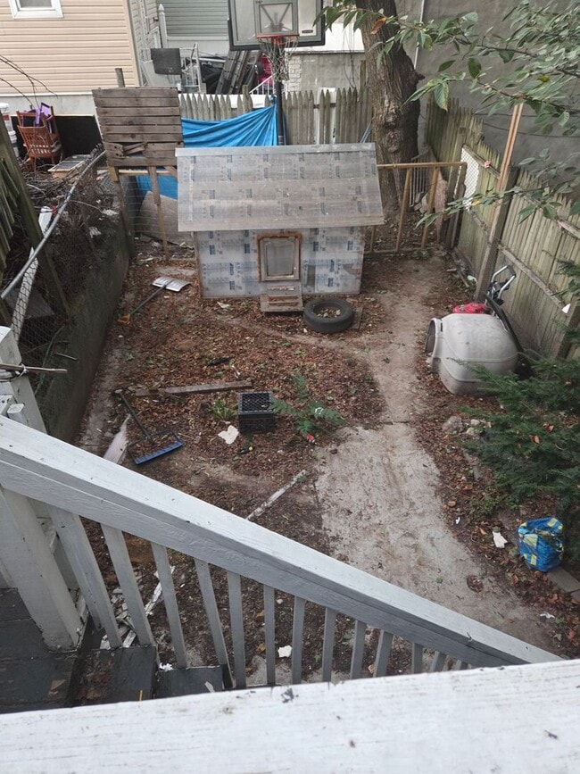 Photo - 5BR/1.5BA Row Home with Backyard and Laund...
