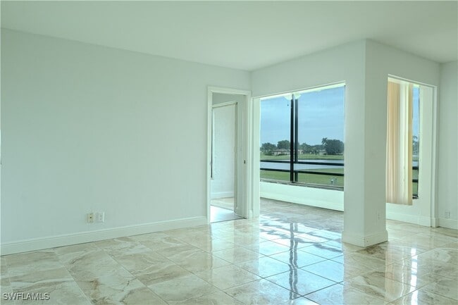 Building Photo - 3655 Boca Ciega Dr Unit 201