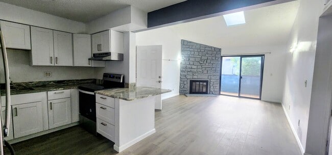 Building Photo - 12033 E Harvard Ave Unit 207
