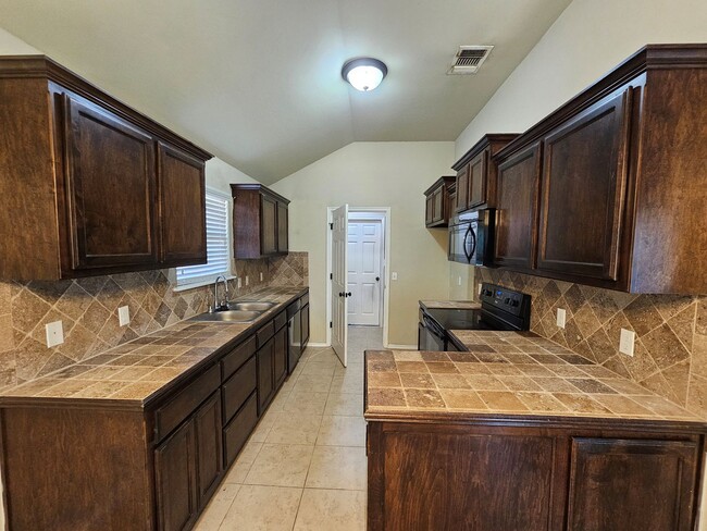 Photo - First month Free ! Large corner lot!