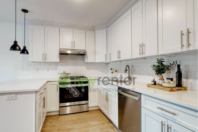 Building Photo - Modern New Construction 2 Bedroom Townhome with Garage & Driveway — First Occupancy!